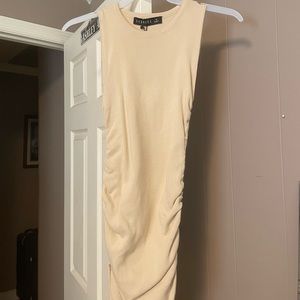 Princess Polly dress. Size Medium. light tan. Adjustable strings on sides.